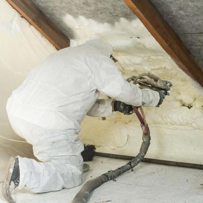 Man using spray foam | YetiFoam